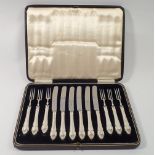 A silver set of fruit cutlery - boxed, Sheffield 1935