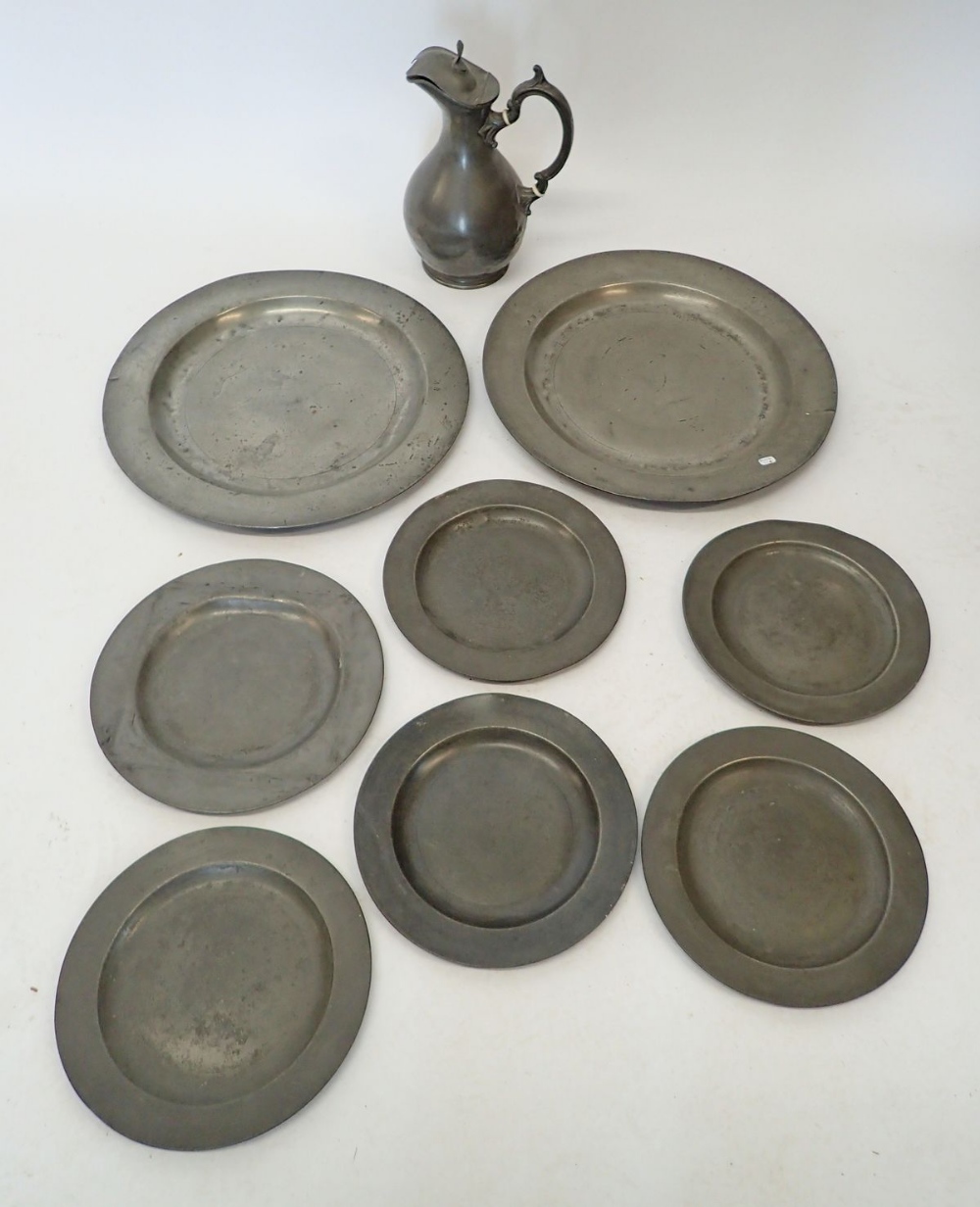 Two early 19th century pewter platters, six plates and an Ashberry & Son ewer