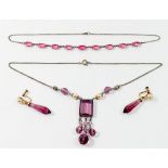 A vintage purple paste and simulated pearl necklace and earrings set place a pink paste necklace