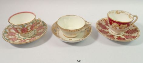 A Royal Crown Derby early 19th century cup and saucer with gilt leaf and orange dot design and two