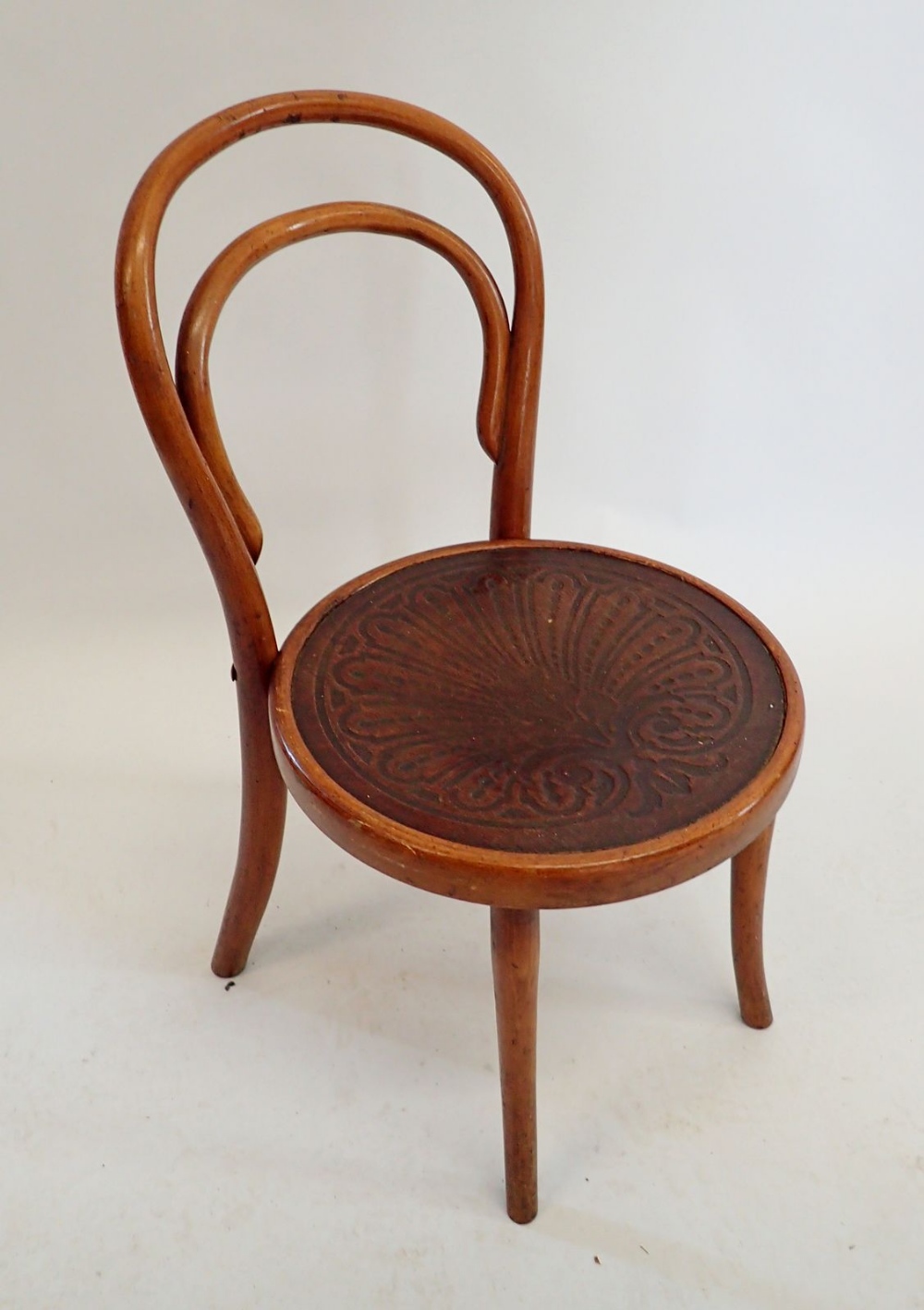A Thonet bentwood child's chair with label