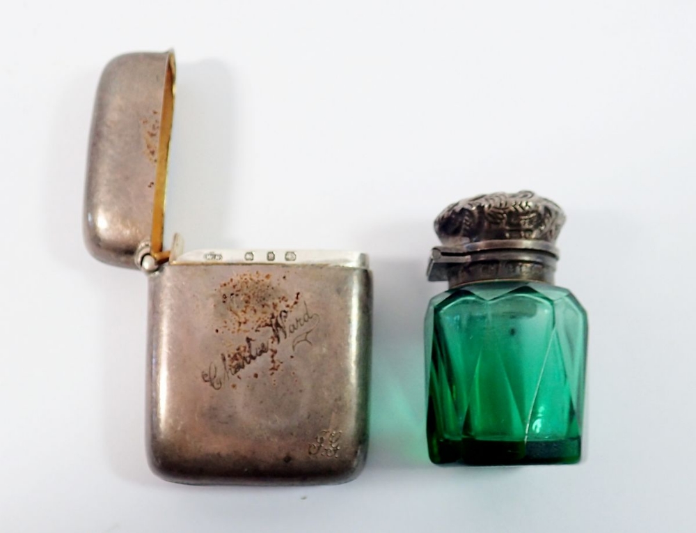 A silver topped green cut glass smelling salts bottle plus a silver vesta case engraved 'Charlie - Image 2 of 2