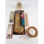 A group of six thermometers including vintage Bakelite example and an indoor/outdoor thermometer