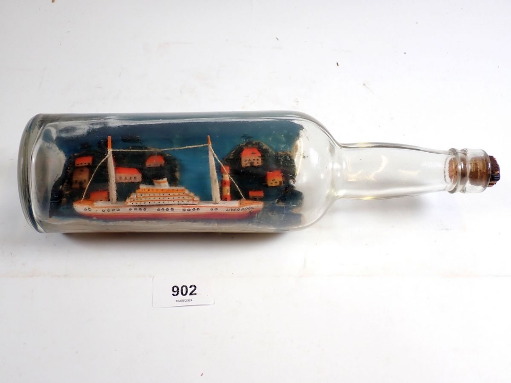 An antique ship in a bottle, 30cm
