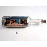 An antique ship in a bottle, 30cm