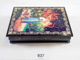 A Russian painted lacquer box decorated scenes from 'The Scarlet Flower' 16 x 11cm