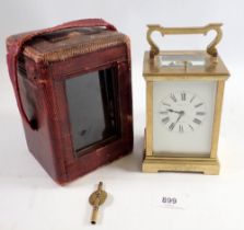 A brass carriage clock retailed by Marcks & Co Ltd, Bombay, presented to Mr Chatterton in Nagpur
