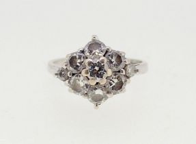 An 18k white gold lozenge form diamond cluster ring, size I-J, 3.2g