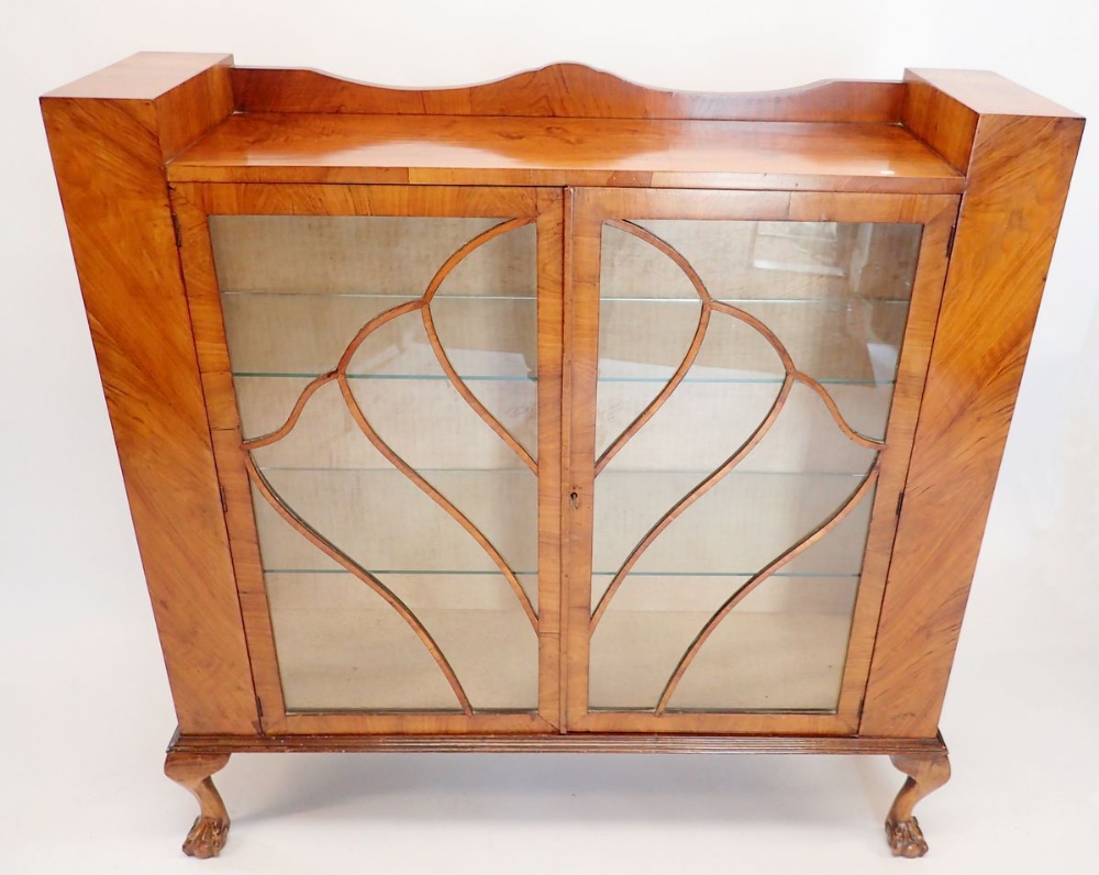 A 1950's walnut two door display cabinet with shell display bars, 119cm wide x 31cm deep - Image 2 of 2