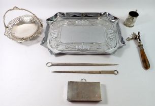 An Art Nouveau chrome embossed tray, two silver plated meat skewers, ham shank holder etc.