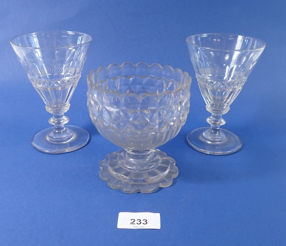 A pair of 19th century cut glass conical glasses, 13cm and an early 19th century cut glass small