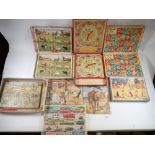 A collection of vintage jigsaws including Victory