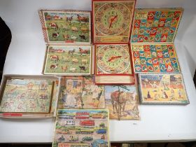 A collection of vintage jigsaws including Victory