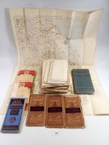 A box of old maps including Bartholomews Tourists Cycle maps, OS maps on linen including military