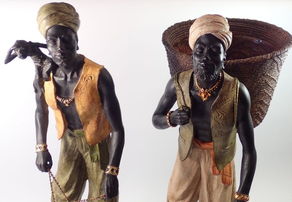 Two large African Indian decorative resin figures, man with monkey and cage and man with fruit - Image 2 of 2