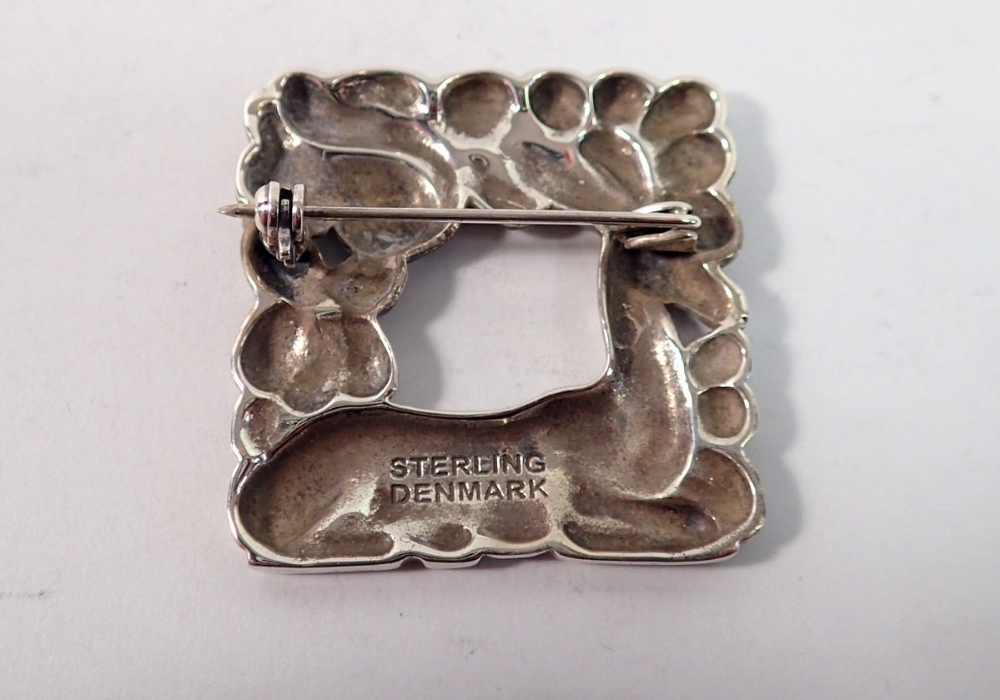 A Danish Sterling silver brooch in Georg Jensen style with deer and squirrel amongst foliage, 3.5 - Image 2 of 2