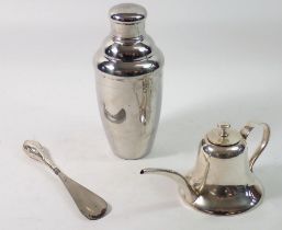 A silver plated cocktail shaker and oil can plus a silver handled shoe horn