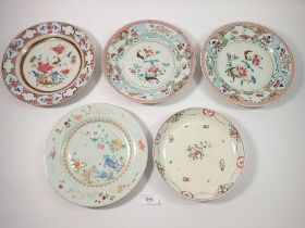 A group of four 18th century Chinese famille rose plates, 23cm diameter and a saucer - all a/f