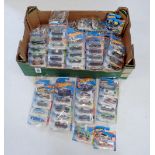 A box of Hot Wheels vehicles, all unopened in original packaging - over 70