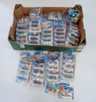 A box of Hot Wheels vehicles, all unopened in original packaging - over 70