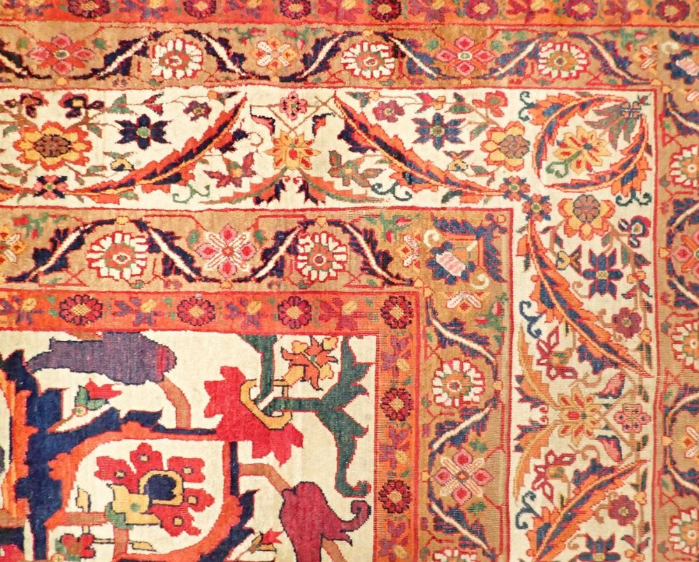An antique silk Tabriz rug with large medallion on blue ground within multiple floral borders, - Image 8 of 8