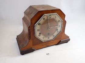 A walnut Art Deco mantel clock, 33cm wide