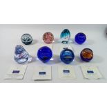 A collection of eight mainly commemorative Caithness paperweights boxed (six with certificates)