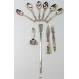 A silver plated arrow form paperknife and various silver plated cutlery