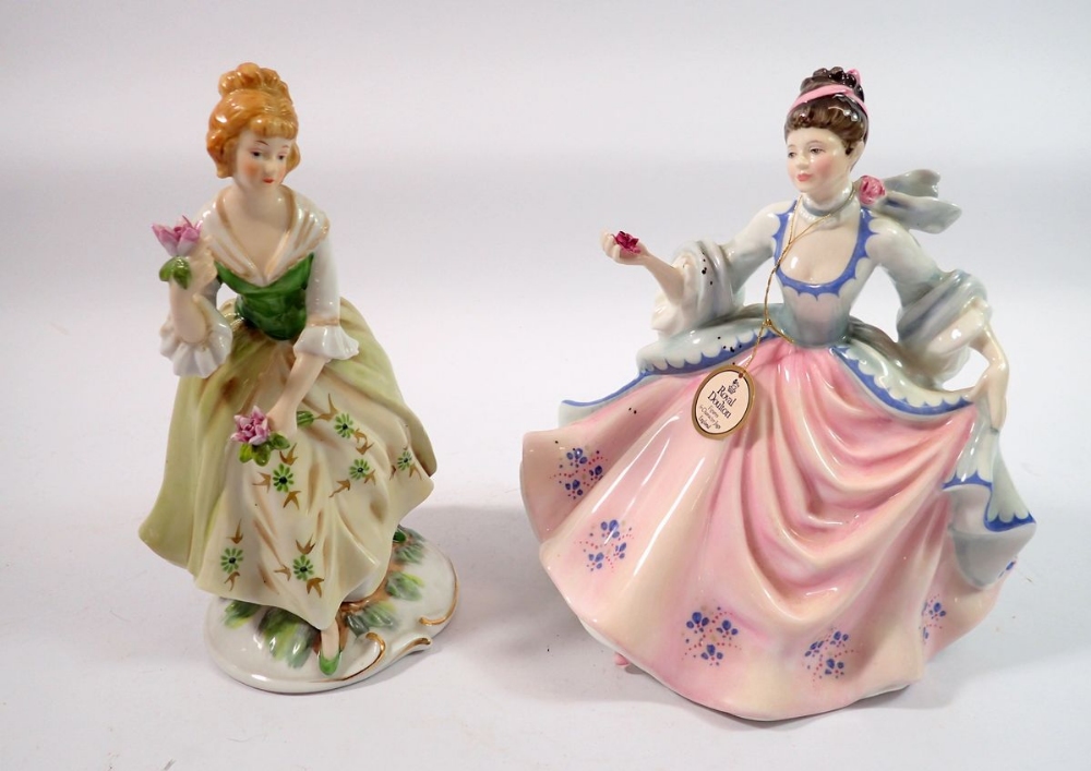 A Royal Doulton figure Rebecca HN2805 plus another figure of a lady with flowers