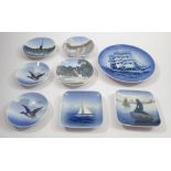 Seven various Copenhagen pin dishes and a plate painted sailing ship