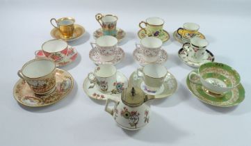 A collection of twelve decorative cabinet cups and saucers including Royal Crown Derby, Worcster,