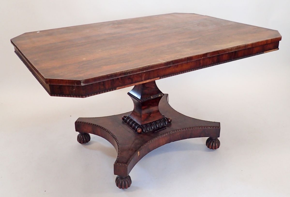 An early 19th century rosewood square tilt top breakfast table with beaded decoration and