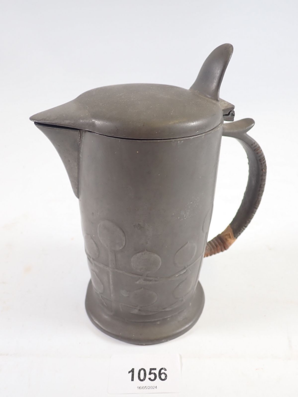 A Tudric pewter Arts & Crafts hot water jug by Archibald Knox for Liberty, No 0967