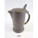 A Tudric pewter Arts & Crafts hot water jug by Archibald Knox for Liberty, No 0967