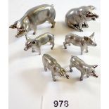 Six metal model miniature pigs, largest 8.5cm