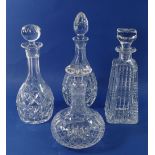 Four various cut glass decanters