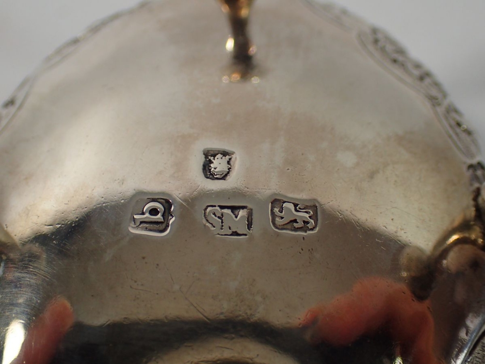 A George III silver oval salt on four hoof feet with embossed floral and scroll decoration, London - Image 2 of 2