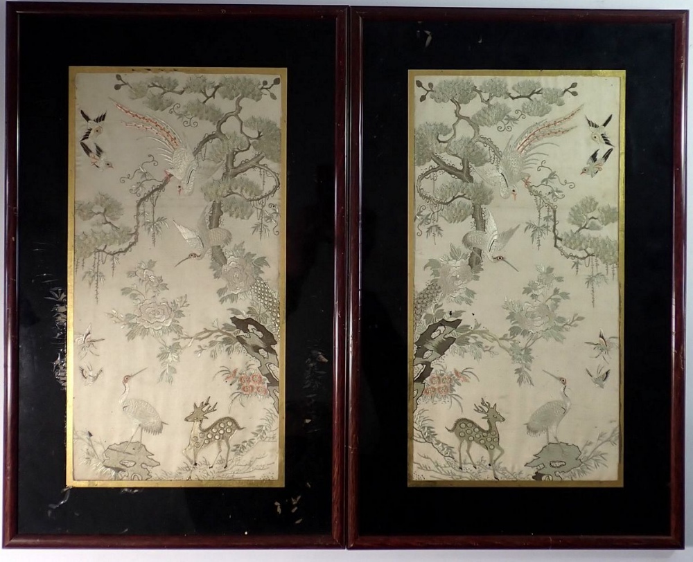 A pair of Chinese embroidered pictures of exotic birds and deer with pine tree, 39 x 20cm