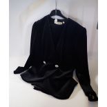 A Frank Usher ladies jacket and skirt in black with detachable white collar and cuffs, size UK 12