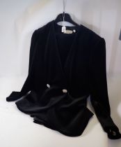 A Frank Usher ladies jacket and skirt in black with detachable white collar and cuffs, size UK 12