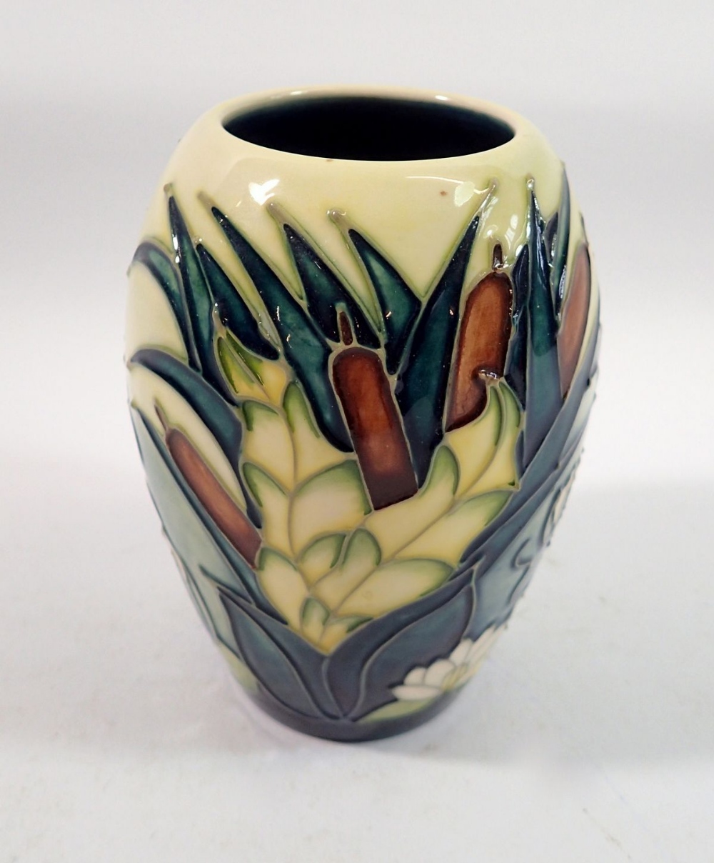A Moorcroft vase in the Lamina pattern, 13cm tall