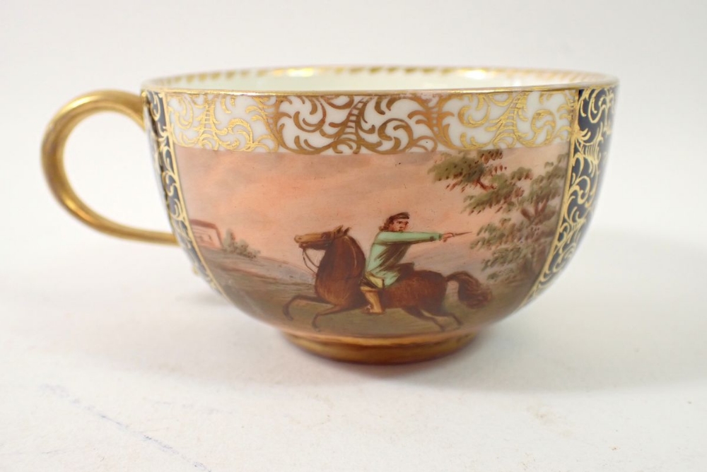 A Meissen cabinet cup painted scenes of men fighting on horseback alternating with blue and gilt - Image 6 of 7