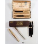 A group of vintage Parker pens including Parker '61' fountain pen and pencil, an 'Arrow roller