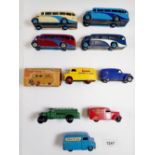 A collection of nine vintage Dinky buses and vans