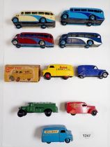 A collection of nine vintage Dinky buses and vans