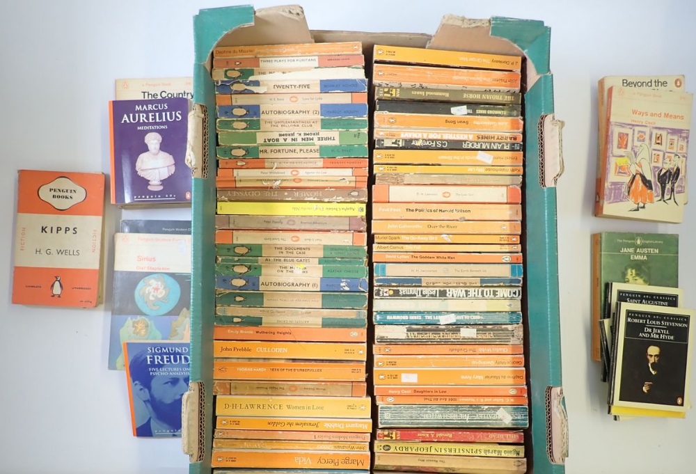 A box of vintage Penguin paperback books