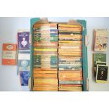 A box of vintage Penguin paperback books