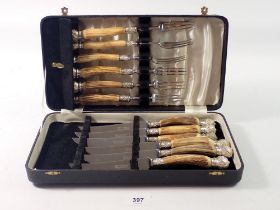 A set of horn handled and silver plated cutlery by H H Pidduck & Sons, cased