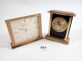 A Swiza 8 day vintage clock with alarm in gilt case plus an Oris 8 day gilt bedside clock with alarm