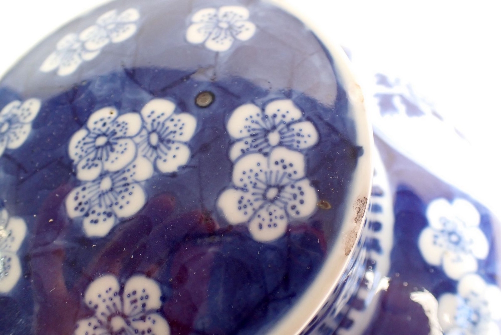 A late Qing Dynasty Chinese blue and white ginger jar with prusnus blossom and panelled - Image 5 of 5